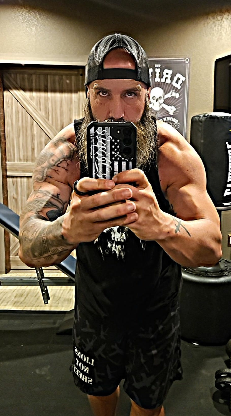 Paul Berens after his rebuild, mirror selfie in his gym